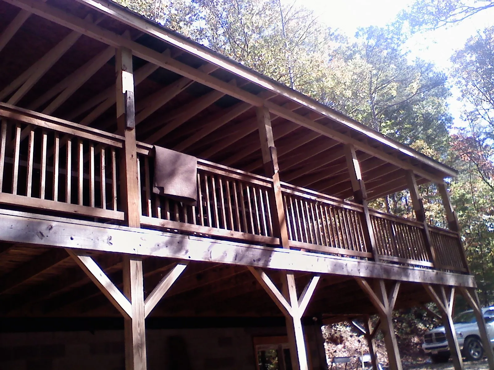 Timber framing under a new elevated porch and deck — Roof Leak Repair in Speer by Roofing Brothers
